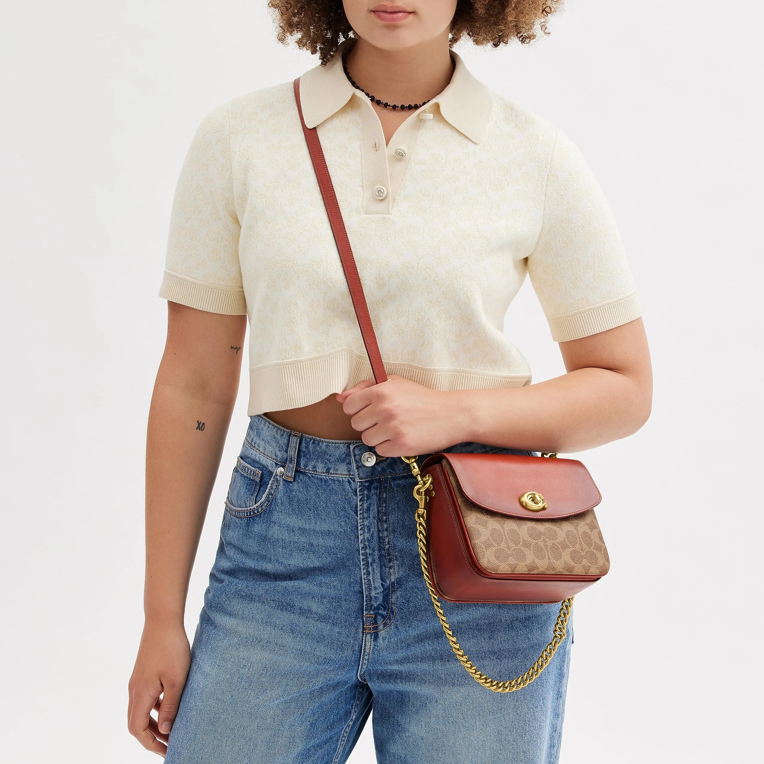 Embrace Timeless Elegance with the COACH Cassie Crossbody 19 in Tan Rust